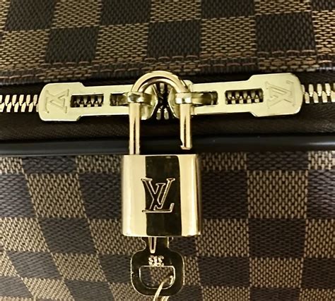 louis vuitton speedy lock and key|louis vuitton card holder.